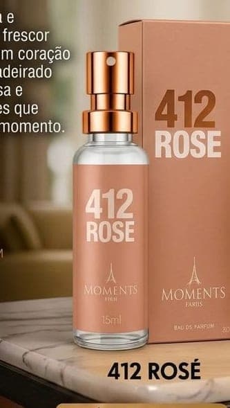 Frasco e caixa do perfume de bolso 412 Rosé da Moments Paris, fragrância amadeirado e floral e frutal.