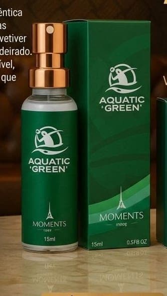 Frasco e caixa do perfume de bolso Aquatic Green da Moments Paris, fragrância verde e amadeirado e aromático.